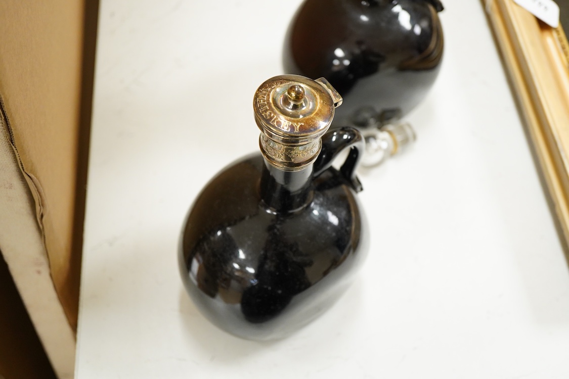 Three Victorian silver mounted glass spirit flasks, engraved 'Brandy', 'Whisky' and 'Gin', Atkin Brothers, Sheffield, 1874, 20.7cm.